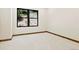 Neutral bedroom with a large window showcasing natural light and outside view at 205 Loop Dr, Georgetown, CO 80444