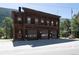 Exterior of historic Georgetown Fire Department building with wooden facade and garage doors at 205 Loop Dr, Georgetown, CO 80444