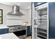 Gourmet kitchen with stainless steel appliances and custom cabinetry at 205 Loop Dr, Georgetown, CO 80444