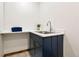 Practical laundry area with a sink, cabinet and countertop space at 205 Loop Dr, Georgetown, CO 80444