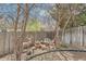 Landscaped backyard featuring a deer sculpture and peaceful garden area at 6376 S Pierson St, Littleton, CO 80127