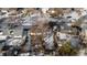 Aerial view of house and neighborhood in winter at 6730 Ingalls St, Arvada, CO 80003