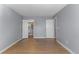 Bedroom with wood flooring and double door closet at 6730 Ingalls St, Arvada, CO 80003