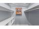 Spacious closet with built-in shelves and hanging rod at 6730 Ingalls St, Arvada, CO 80003