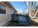 Back deck with stairs leading to the yard at 6730 Ingalls St, Arvada, CO 80003