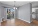 Dining area with light gray walls and sliding doors to deck at 6730 Ingalls St, Arvada, CO 80003