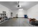 Spacious garage with shelving and ample storage space at 6730 Ingalls St, Arvada, CO 80003