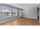 Living room with hardwood floors and neutral walls at 6730 Ingalls St, Arvada, CO 80003