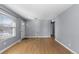 Living room with hardwood floors and neutral walls at 6730 Ingalls St, Arvada, CO 80003