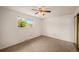 Simple bedroom with neutral decor and plush carpet at 6413 W 76Th Ave, Arvada, CO 80003