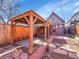 Backyard patio area with a stylish gazebo, ideal for outdoor relaxation and entertainment at 1256 S Pennsylvania St, Denver, CO 80210