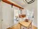 View of bedroom, kitchenette with tile countertops, sink and island and the living room at 1256 S Pennsylvania St, Denver, CO 80210