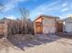 View of an outdoor shed with double doors on a sunny day, showing storage potential at 1256 S Pennsylvania St, Denver, CO 80210