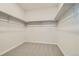 Spacious walk-in closet with double hanging rods at 13840 Deertrack Ln, Parker, CO 80134