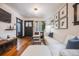 Bright living room featuring hardwood floors and a comfortable sectional sofa at 331 S Washington St, Denver, CO 80209