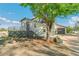 Inviting home with a charming front yard, updated exterior, and a spacious two-car garage at 5385 W 51St Ave, Denver, CO 80212