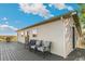 Stunning exterior with a spacious deck, comfortable seating, and scenic views beyond at 5385 W 51St Ave, Denver, CO 80212