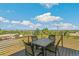 Outdoor dining area on a spacious deck, perfect for enjoying meals with scenic views at 5385 W 51St Ave, Denver, CO 80212