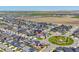 An aerial view of the neighborhood highlighting the house location within the surrounding community at 9716 Uravan St, Commerce City, CO 80022