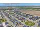 An aerial view showing the home's proximity to Eastpoint Park and Southlawn Elementary at 9716 Uravan St, Commerce City, CO 80022