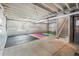 Spacious unfinished basement with exposed ceiling and walls, offering customization potential at 9716 Uravan St, Commerce City, CO 80022