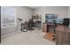 Office area with natural light, desk, and comfortable seating, ideal for a productive workspace at 9716 Uravan St, Commerce City, CO 80022