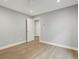 Neutral bedroom showcasing beautiful hardwood floors and natural light at 3538 Pecos St, Denver, CO 80211