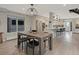 Dining area with modern table set adjacent to a contemporary kitchen area at 3538 Pecos St, Denver, CO 80211