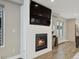 Living room fireplace with modern design featuring a large television above it at 3538 Pecos St, Denver, CO 80211
