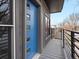 Modern front door with stylish details and outdoor balcony access at 3538 Pecos St, Denver, CO 80211
