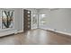 Living room with abundant natural light and hardwood flooring at 3538 Pecos St, Denver, CO 80211