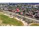 Aerial view showing the property's proximity to the local golf course in a desirable community, great for recreation at 2685 S Dayton Way # 141, Denver, CO 80231