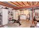 Spacious unfinished basement features utilities, storage, and laundry area at 2685 S Dayton Way # 141, Denver, CO 80231