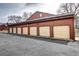 A row of individual garages with numbered doors for convenient parking at 2685 S Dayton Way # 141, Denver, CO 80231