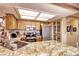 Modern kitchen with stainless steel appliances, granite countertops, and custom cabinetry at 2685 S Dayton Way # 141, Denver, CO 80231