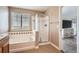 Bright bathroom with a soaking tub, glass-enclosed shower, and modern fixtures at 19431 E Wyoming Ave, Aurora, CO 80017