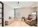 Cozy bedroom with comfortable seating, neutral walls, and a serene atmosphere at 19431 E Wyoming Ave, Aurora, CO 80017