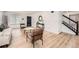 Inviting living room featuring stylish decor, wood floors, and a cozy seating area at 19431 E Wyoming Ave, Aurora, CO 80017