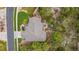 An aerial view of a home showcasing a spacious yard, water feature and outdoor living at 20166 E Shady Ridge Rd, Parker, CO 80134