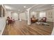 Expansive basement with wood floors, recessed lighting, and decorative columns at 20166 E Shady Ridge Rd, Parker, CO 80134