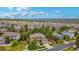 Beautiful two-story home nestled within a vibrant neighborhood and lush green trees at 20166 E Shady Ridge Rd, Parker, CO 80134