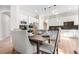 Bright kitchen showcases stainless steel appliances and modern lighting for a clean and stylish aesthetic at 20166 E Shady Ridge Rd, Parker, CO 80134