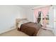 Bright bedroom with double bed and large window at 5769 S Nepal Ct, Centennial, CO 80015