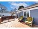 Wooden deck with seating area, overlooking backyard at 5769 S Nepal Ct, Centennial, CO 80015