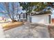 House exterior with driveway and landscaping at 5769 S Nepal Ct, Centennial, CO 80015