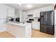 Modern kitchen with stainless steel appliances at 5769 S Nepal Ct, Centennial, CO 80015