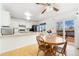 Kitchen with stainless steel appliances and breakfast nook at 5769 S Nepal Ct, Centennial, CO 80015