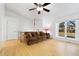 Living room with hardwood floors and a ceiling fan at 5769 S Nepal Ct, Centennial, CO 80015