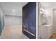 Open bonus room adjacent to 3/4 bathroom showcasing hardwood floor and blackboard at 5716 S Lisbon Way, Centennial, CO 80015