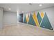 Spacious living room featuring colorful mountain design, hardwood floors, and recessed lights at 5716 S Lisbon Way, Centennial, CO 80015